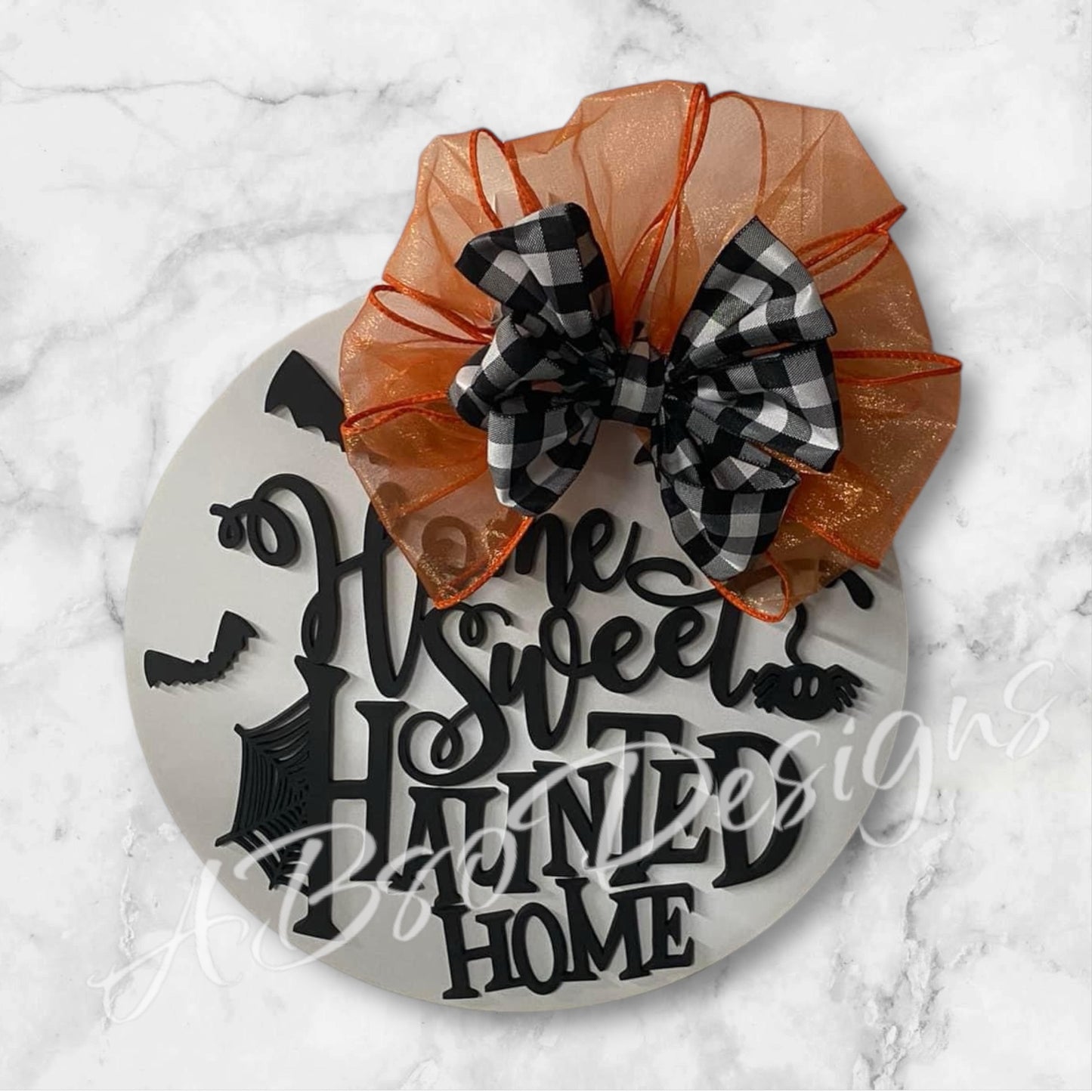 Home sweet haunted home door hanger