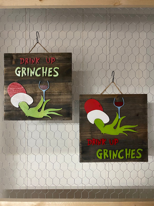 Drink up grinches sign